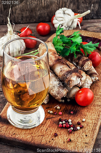 Image of grilled Turkey sausages with beer