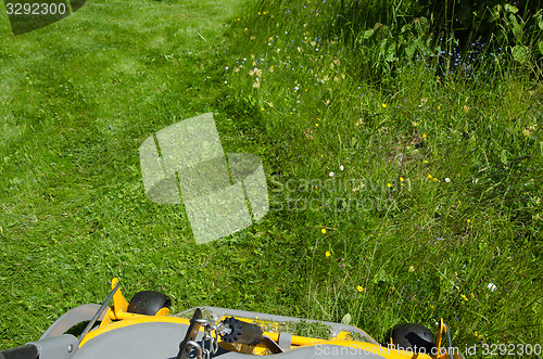 Image of Cutting the lawn