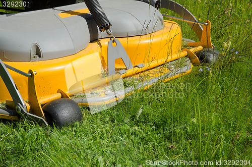 Image of Detail of a riding lawn-mower