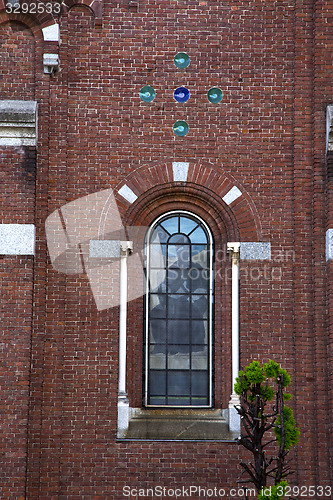 Image of rose window  italy  lombardy     in  the cardano    closed brick