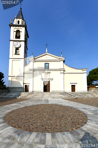 Image of cadrezzate    the old   church  closed   tower sidewalk italy  l