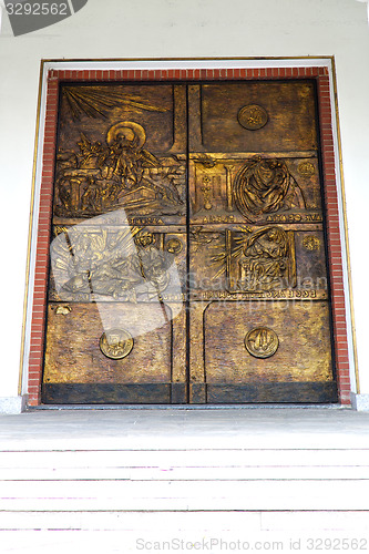 Image of abstract  church door   italy  lombardy   column gold