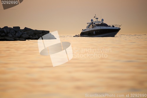 Image of Boat with dinghy in Adriatic sea