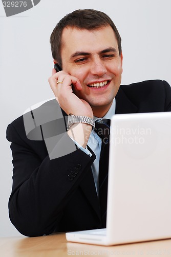 Image of Businessman having telephone conversation