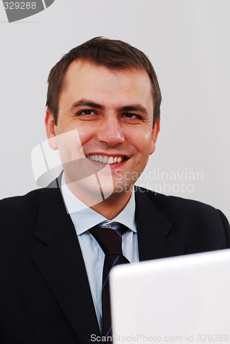 Image of Successful businessman smiling