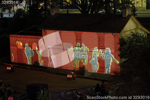 Image of Cadmans Cottage in lights Vivid Sydney