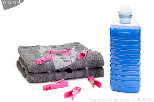 Image of Laundry detergent with clothespins