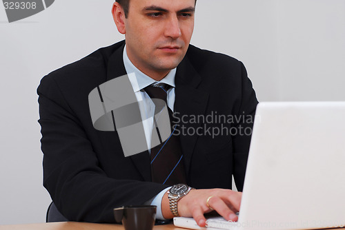 Image of Entrepreneur working on his laptop