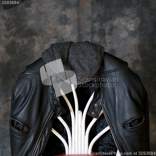 Image of leather motorcycle jacket and hat