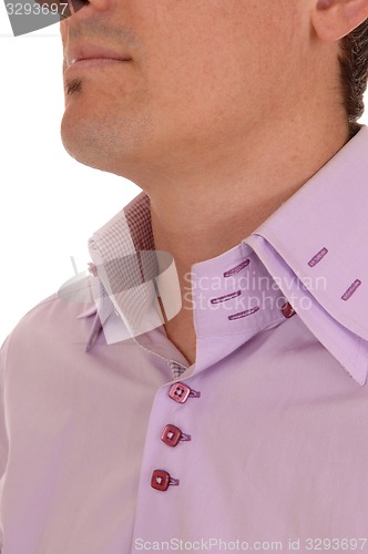 Image of Closeup of a shirt collar.