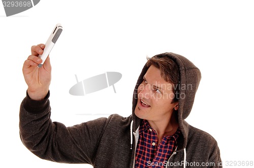 Image of Man taking cell phone picture.