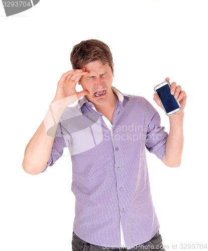 Image of Man crying for broken phone.