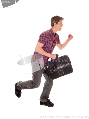 Image of Man running with briefcase.