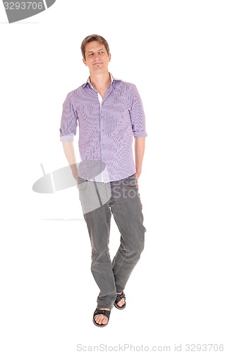 Image of Man standing relaxed.
