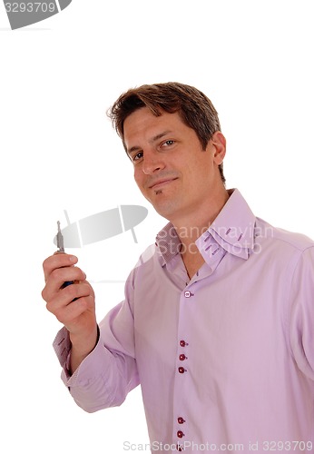Image of Man holding his car key\'s.