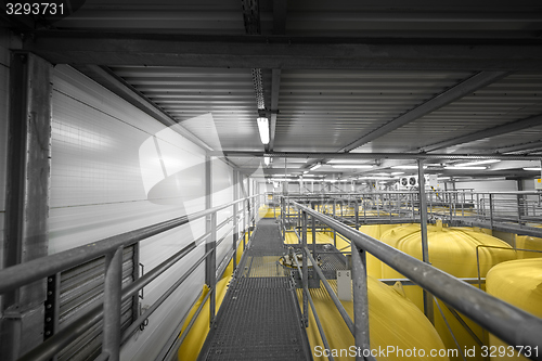 Image of Industrial interior with welded silos