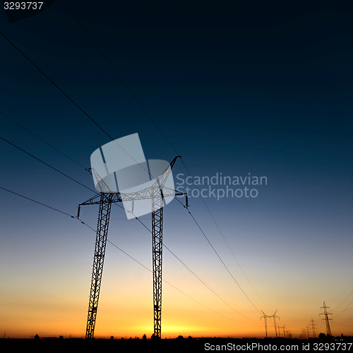 Image of Large transmission towers at blue hour 