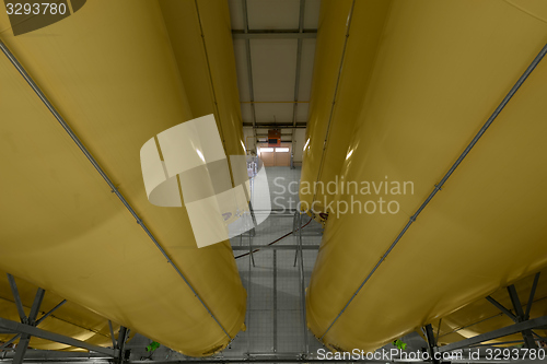 Image of Industrial interior with welded silos