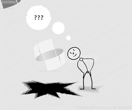Image of man looking down into the hole
