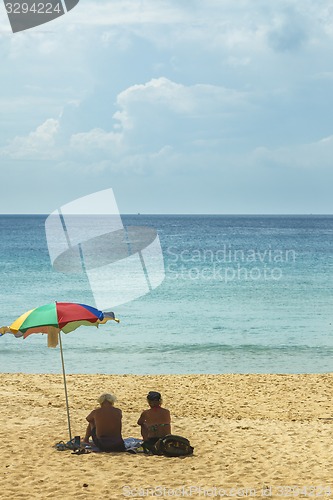 Image of Elderly couple on the beach