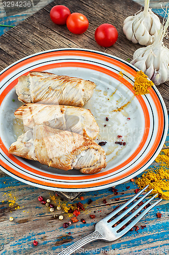 Image of set fried meat sausages on wooden background