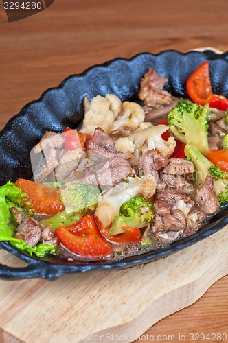 Image of meat with vegetables