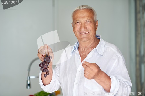 Image of senior man sitting outside