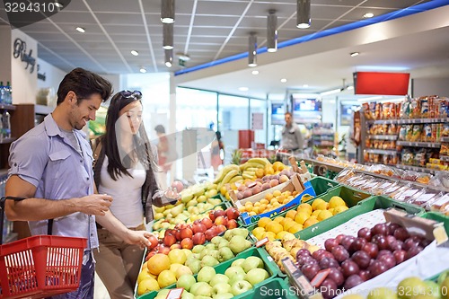 Image of couple shopping in a supermarket