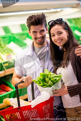 Image of couple shopping in a supermarket