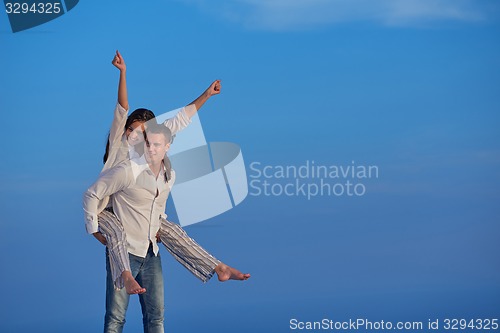 Image of happy young romantic couple have fun arelax  relax at home