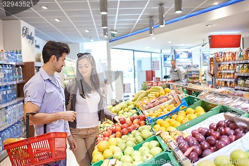 Image of couple shopping in a supermarket