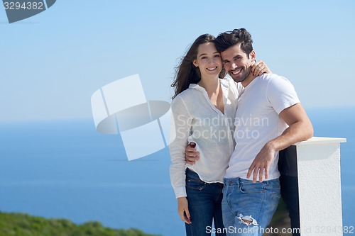 Image of happy young romantic couple have fun arelax  relax at home