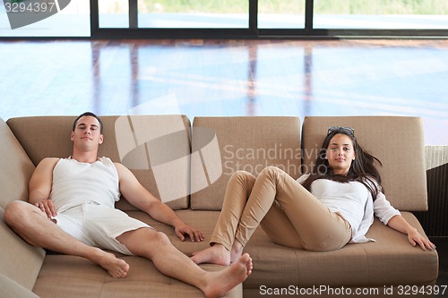 Image of happy young romantic couple have fun arelax  relax at home