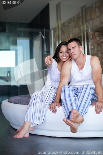 Image of couple relax and have fun in bed