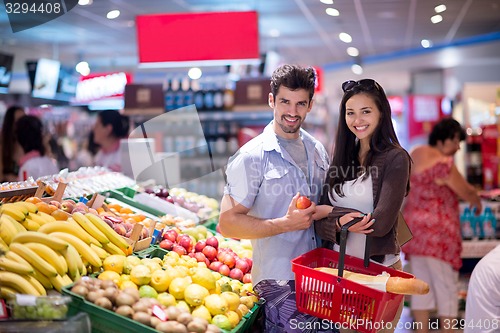 Image of couple shopping in a supermarket
