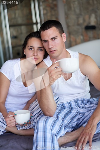 Image of couple relax and have fun in bed