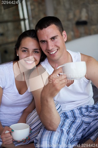 Image of couple relax and have fun in bed