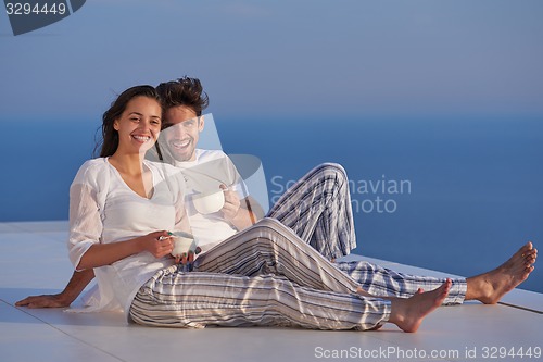 Image of happy young romantic couple have fun arelax  relax at home