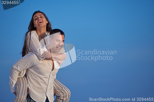 Image of happy young romantic couple have fun arelax  relax at home