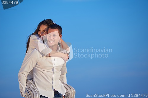 Image of happy young romantic couple have fun arelax  relax at home