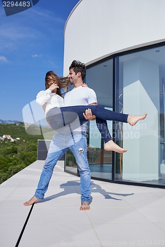 Image of happy young romantic couple have fun arelax  relax at home