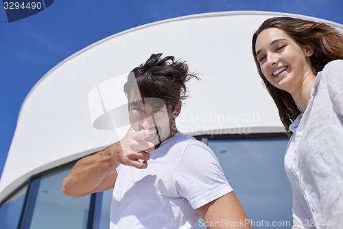 Image of happy young romantic couple have fun arelax  relax at home