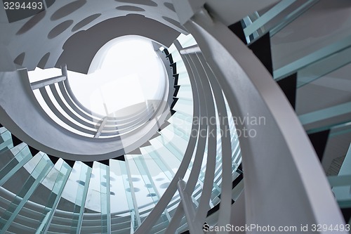 Image of modern glass spiral staircase