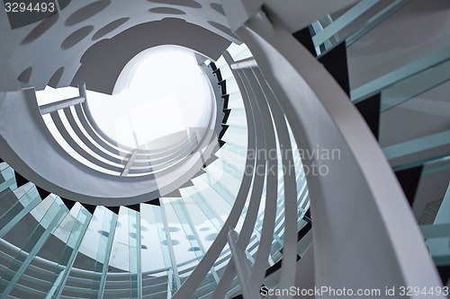 Image of modern glass spiral staircase