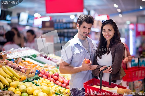 Image of couple shopping in a supermarket