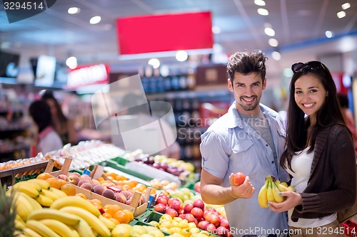 Image of couple shopping in a supermarket