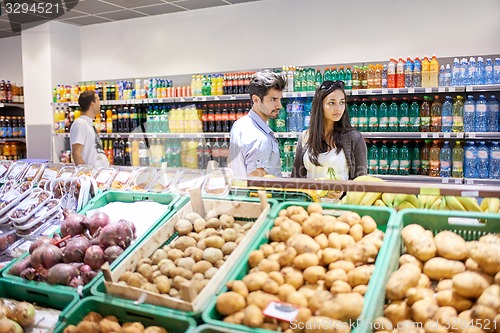 Image of couple shopping in a supermarket