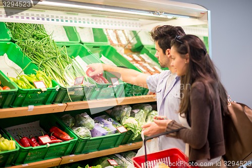 Image of couple shopping in a supermarket