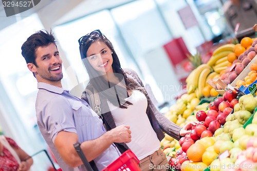 Image of couple shopping in a supermarket