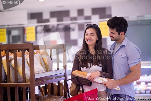 Image of couple shopping in a supermarket